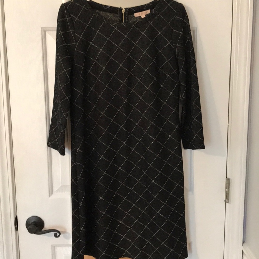 Black dress with gold detailing.